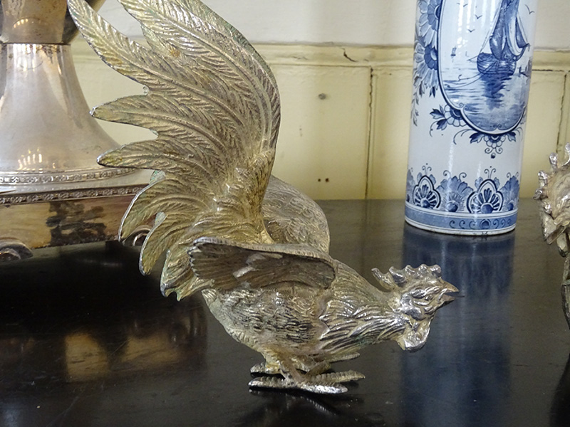 Silver plate fighting cocks
